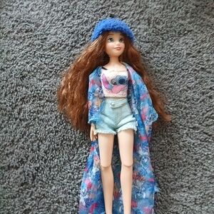 Stylish Doll with Blue Outfit and Hat